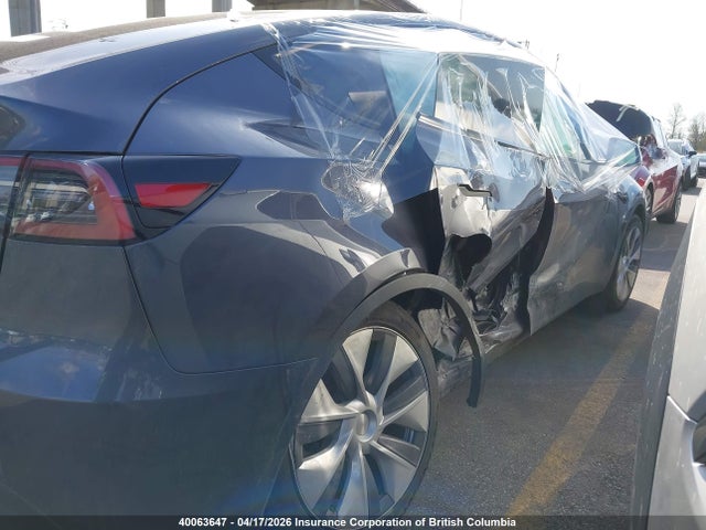 40063647 :رقم المزاد ، LRWYGDFDXPC164054 vin ، 2023 Tesla Model Y مزاد بيع
