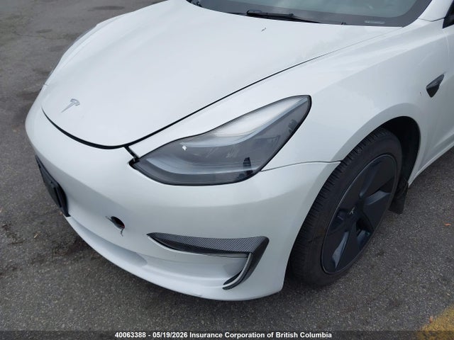 Продажа на аукционе авто 2023 Tesla Model 3, vin: LRW3E1EB6PC923409, номер лота: 40063388