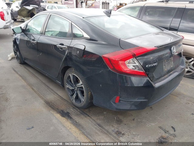 Продажа на аукционе авто 2018 Honda Civic Touring, vin: 2HGFC1F95JH101045, номер лота: 40065746