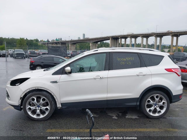 Продажа на аукционе авто 2014 Ford Escape Titanium, vin: 1FMCU0J9XEUA95631, номер лота: 40069751
