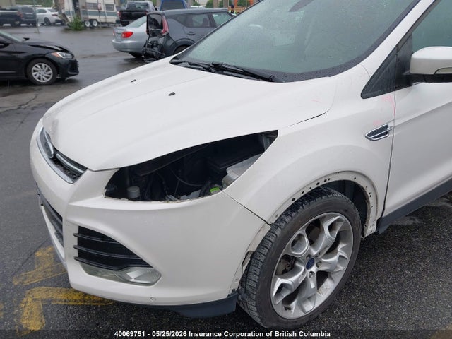 Продажа на аукционе авто 2014 Ford Escape Titanium, vin: 1FMCU0J9XEUA95631, номер лота: 40069751