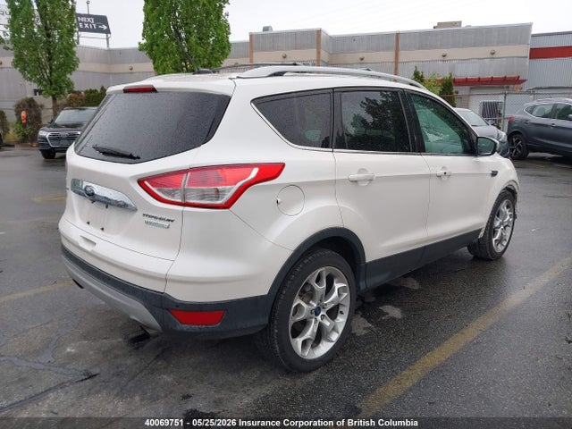 Продажа на аукционе авто 2014 Ford Escape Titanium, vin: 1FMCU0J9XEUA95631, номер лота: 40069751