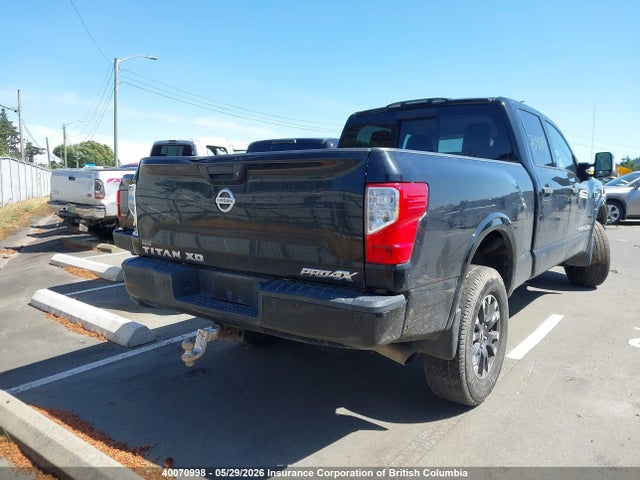 40070998 :رقم المزاد ، 1N6BA1F49JN529034 vin ، 2018 Nissan Titan مزاد بيع