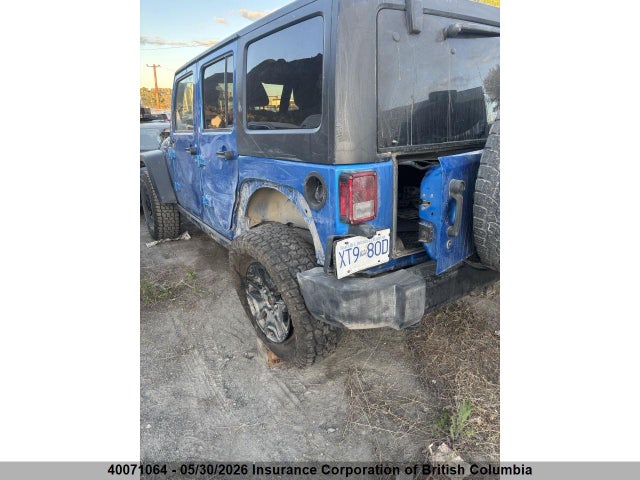 40071064 :رقم المزاد ، 1C4BJWDG0FL716064 vin ، 2015 Jeep Wrangler Unlimited Sport مزاد بيع