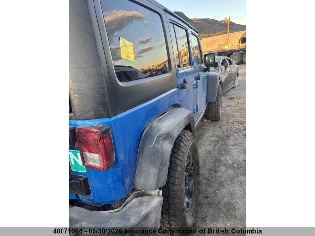 40071064 :رقم المزاد ، 1C4BJWDG0FL716064 vin ، 2015 Jeep Wrangler Unlimited Sport مزاد بيع