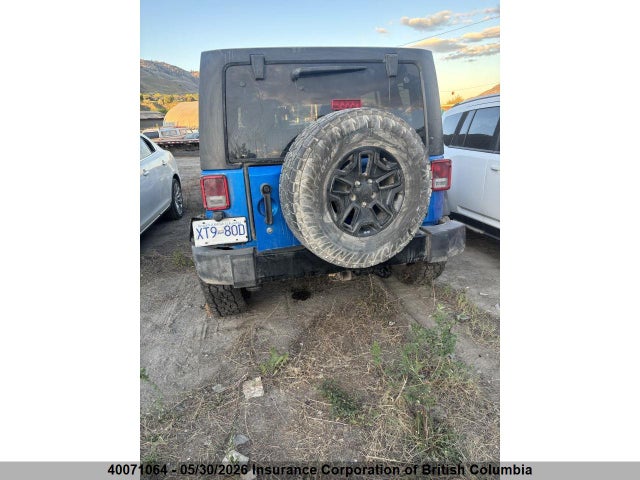 40071064 :رقم المزاد ، 1C4BJWDG0FL716064 vin ، 2015 Jeep Wrangler Unlimited Sport مزاد بيع