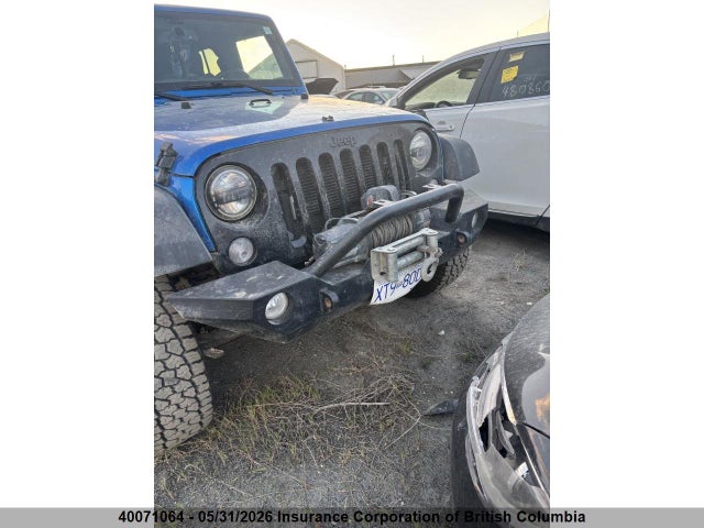 40071064 :رقم المزاد ، 1C4BJWDG0FL716064 vin ، 2015 Jeep Wrangler Unlimited Sport مزاد بيع
