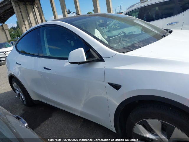 Tesla Model Y 2023 LRWYGDEE8PC161633 Image 12