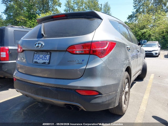40069131 :رقم المزاد ، 5XYZUDLA8FG291244 vin ، 2015 Hyundai Santa Fe Sport مزاد بيع