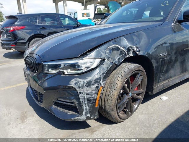 40075986 :رقم المزاد ، WBA5P9C09NFM42052 vin ، 2022 Bmw 330e مزاد بيع