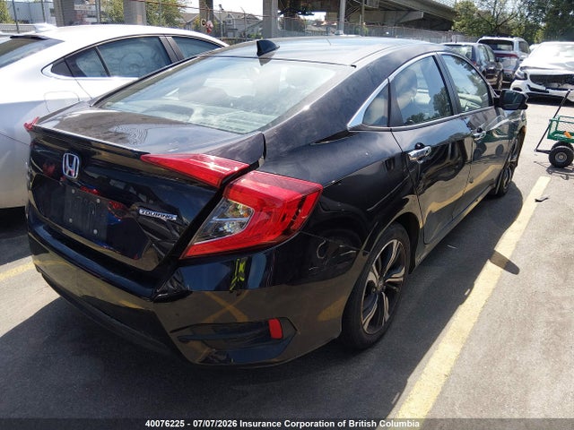 Auction sale of the 2017 Honda Civic Touring, vin: 2HGFC1F97HH101851, lot number: 40076225