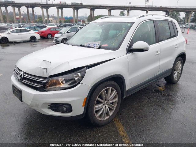 WVGJV3AX4EW572627 Volkswagen Tiguan S/se/sel/r-line