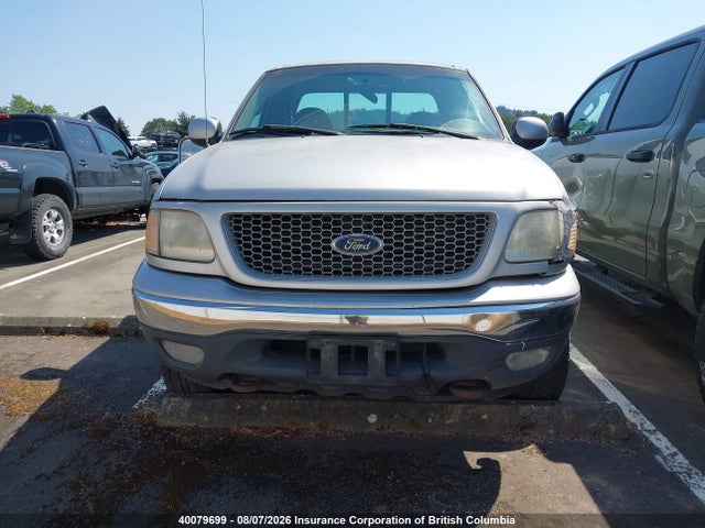 40079699 :رقم المزاد ، 2FTRX18W8XCA75890 vin ، 1999 Ford F150 مزاد بيع