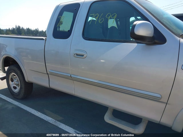 40079699 :رقم المزاد ، 2FTRX18W8XCA75890 vin ، 1999 Ford F150 مزاد بيع