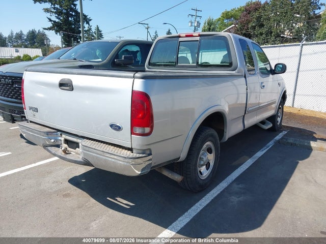 40079699 :رقم المزاد ، 2FTRX18W8XCA75890 vin ، 1999 Ford F150 مزاد بيع