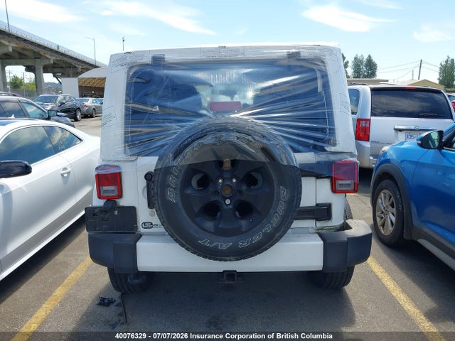 Auction sale of the 2016 Jeep Wrangler Unlimited Sahara, vin: 1C4BJWEG1GL122356, lot number: 40076329
