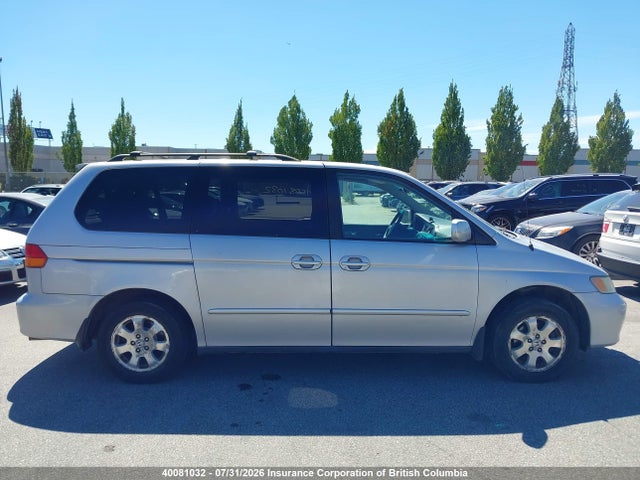 40081032 :رقم المزاد ، 2HKRL18903H010168 vin ، 2003 Honda Odyssey Exl مزاد بيع