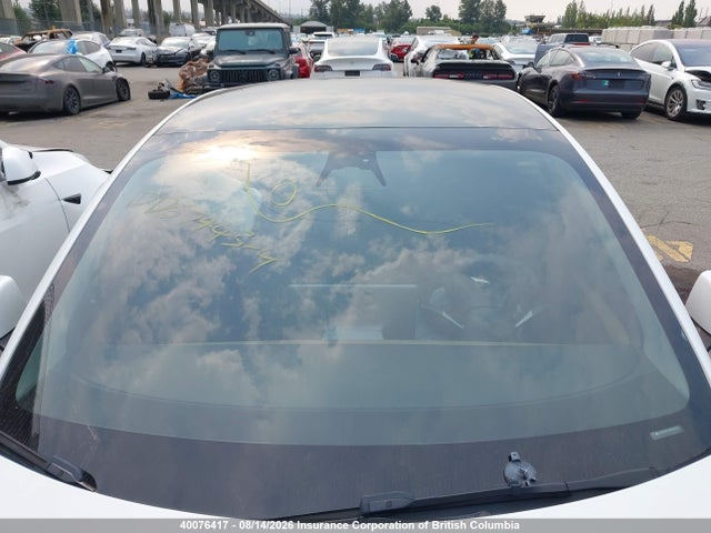 40076417 :رقم المزاد ، LRW3E1FA5PC920720 vin ، 2023 Tesla Model 3 مزاد بيع