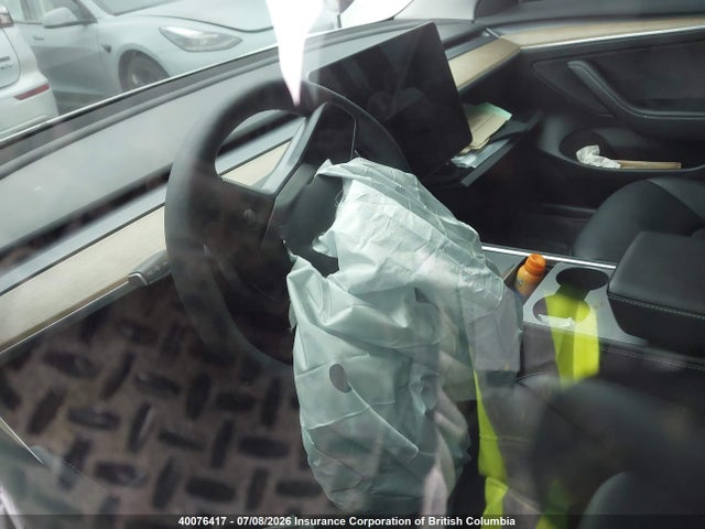 40076417 :رقم المزاد ، LRW3E1FA5PC920720 vin ، 2023 Tesla Model 3 مزاد بيع