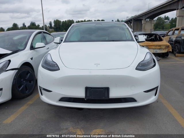 Tesla Model Y 2023 LRWYGDFD1PC967819 Image 13