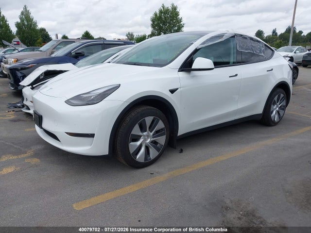 Tesla Model Y 2023 LRWYGDFD1PC967819 Image 2