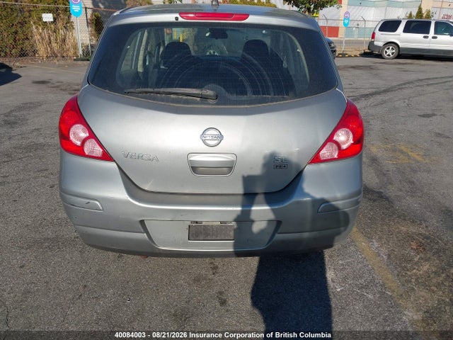 40084003 :رقم المزاد ، 3N1BC13E49L492922 vin ، 2009 Nissan Versa مزاد بيع