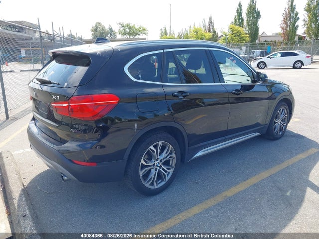 BMW X1 2017 WBXHT3C36H5F75614 Image 4
