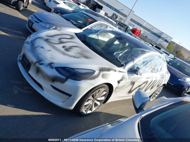 40082011 :رقم المزاد ، 5YJ3E1EA3NF357350 vin ، 2022 Tesla Model 3 مزاد بيع