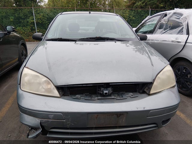 40086472 :رقم المزاد ، 1FAFP34N35W171509 vin ، 2005 Ford Focus Zx4 مزاد بيع