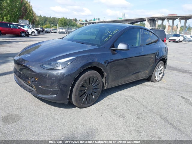 Tesla Model Y 2024 7SAYGDED1RF060596 Image 2