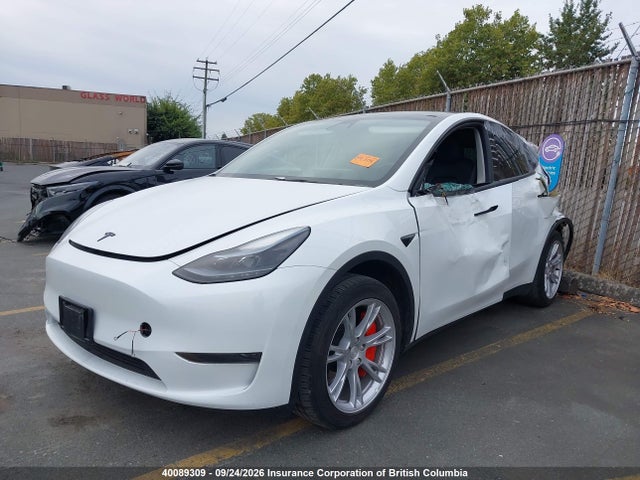 Tesla Model Y 2023 LRWYGDFD6PC902853 Image 2