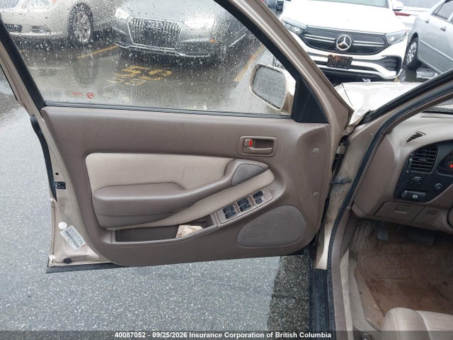 40087052 :رقم المزاد ، JT2GK12E8R0015553 vin ، 1994 Toyota Camry Le مزاد بيع