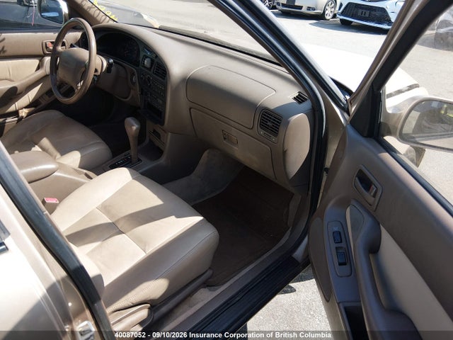 40087052 :رقم المزاد ، JT2GK12E8R0015553 vin ، 1994 Toyota Camry Le مزاد بيع