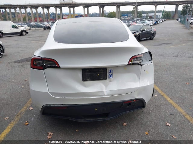 40089650 :رقم المزاد ، LRWYGDFD8PC929441 vin ، 2023 Tesla Model Y مزاد بيع