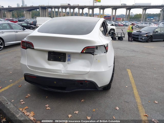 40089650 :رقم المزاد ، LRWYGDFD8PC929441 vin ، 2023 Tesla Model Y مزاد بيع