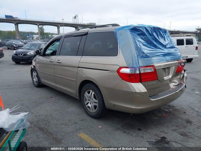 40091011 :رقم المزاد ، 5FNRL38657B513796 vin ، 2007 Honda Odyssey Exl مزاد بيع