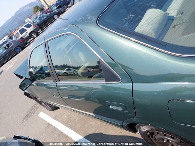 40084595 :رقم المزاد ، JT2BG22K4X0347574 vin ، 1999 Toyota Camry Le/xle مزاد بيع
