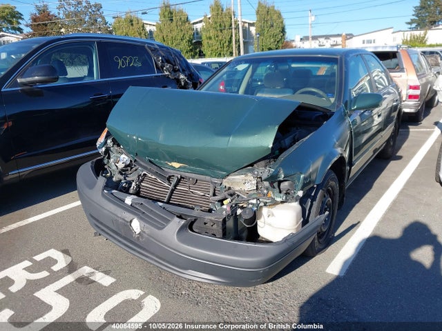 40084595 :رقم المزاد ، JT2BG22K4X0347574 vin ، 1999 Toyota Camry Le/xle مزاد بيع