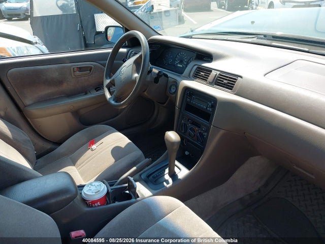 40084595 :رقم المزاد ، JT2BG22K4X0347574 vin ، 1999 Toyota Camry Le/xle مزاد بيع