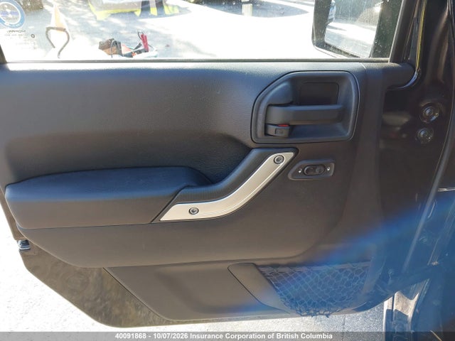 40091868 :رقم المزاد ، 1C4BJWEG1EL150798 vin ، 2014 Jeep Wrangler Unlimited Sahara مزاد بيع