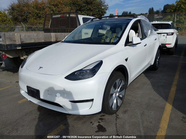 Tesla Model Y 2023 LRWYGDEE6PC265103 Image 2