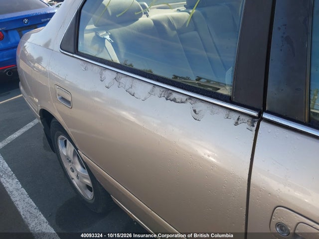 40093324 :رقم المزاد ، JT2BG22K310532822 vin ، 2001 Toyota Camry مزاد بيع