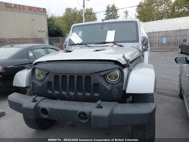 40089174 :رقم المزاد ، 1C4BJWDG5DL677095 vin ، 2013 Jeep Wrangler Unlimited Sport مزاد بيع