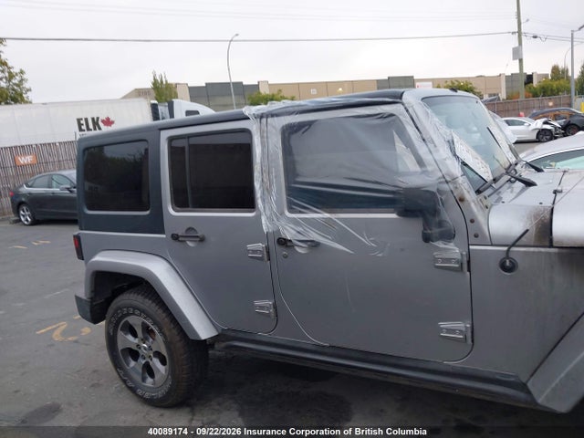 40089174 :رقم المزاد ، 1C4BJWDG5DL677095 vin ، 2013 Jeep Wrangler Unlimited Sport مزاد بيع