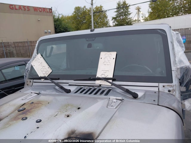 40089174 :رقم المزاد ، 1C4BJWDG5DL677095 vin ، 2013 Jeep Wrangler Unlimited Sport مزاد بيع