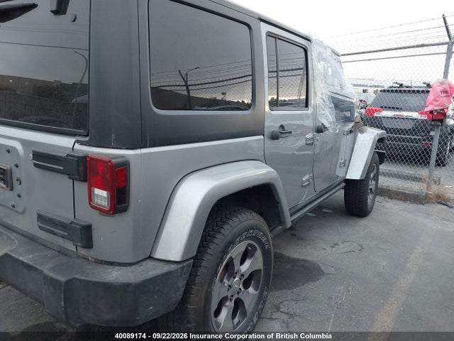 40089174 :رقم المزاد ، 1C4BJWDG5DL677095 vin ، 2013 Jeep Wrangler Unlimited Sport مزاد بيع