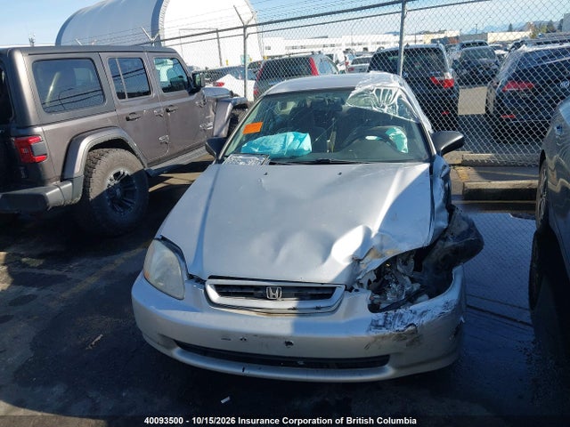 40093500 :رقم المزاد ، 1HGEJ6227WL802803 vin ، 1998 Honda Civic Dx مزاد بيع