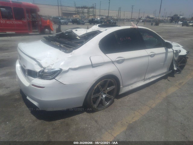 2014 BMW M5, VIN: WBSFV9C54ED593815