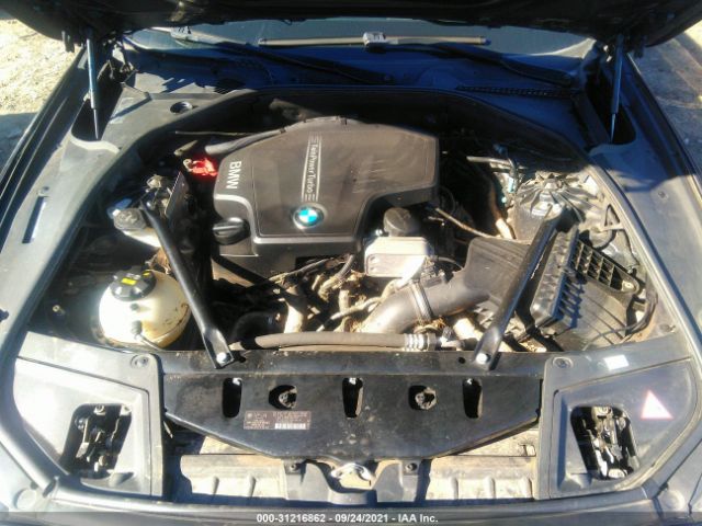 WBA5A5C55ED509618 BMW 5 Series 528i