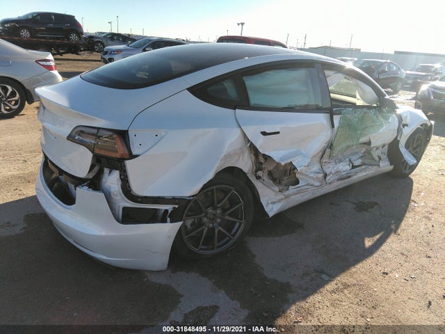 2021 Tesla Model 3 Standard Range Plus მანქანა იყიდება აუქციონზე, vin: 5YJ3E1EA1MF996096, აუქციონის ნომერი: 31848495